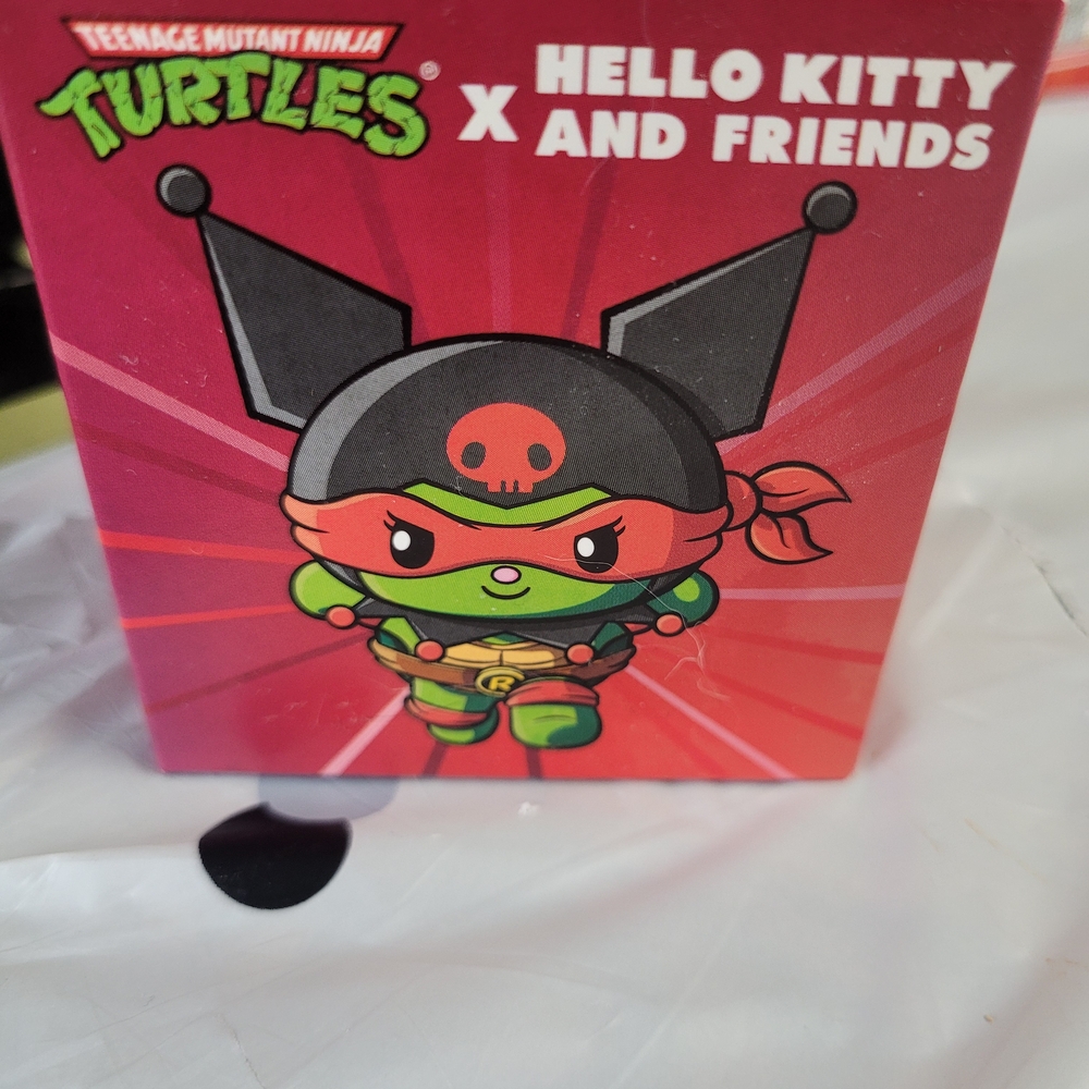 2/ $15 Teenage Mutant Ninja Turtles x Hello Kitty Figure McDonalds
